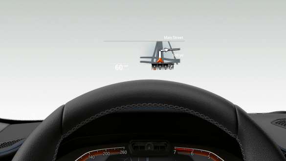 BMW Série 3 Berlina, BMW Head-Up Display. Grande plano frontal de metade do volante e do para-brisas do BMW Série 3 Berlina com BMW Head-Up Display.