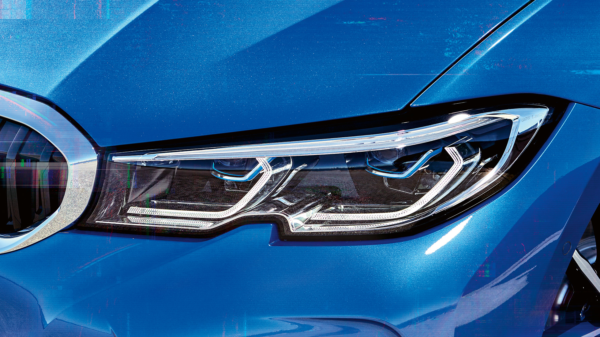 BMW Série 3 Berlina, BMW Laserlight. Grande plano lateral do farol direito com BMW Laserlight.