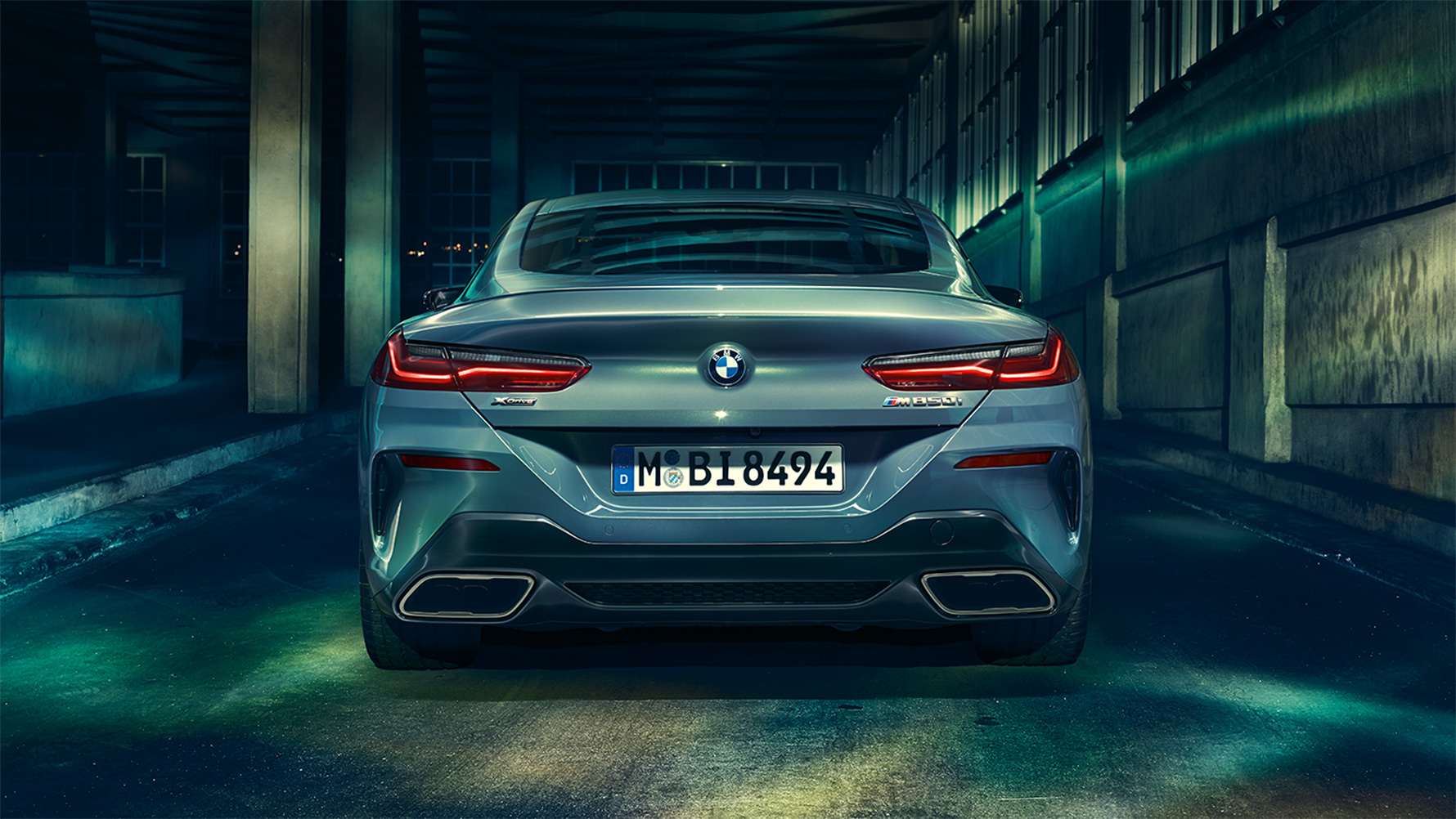 BMW 8 Series Coupé, rear view Rear view of the BMW 8 Series Coupé at night in an urban setting.