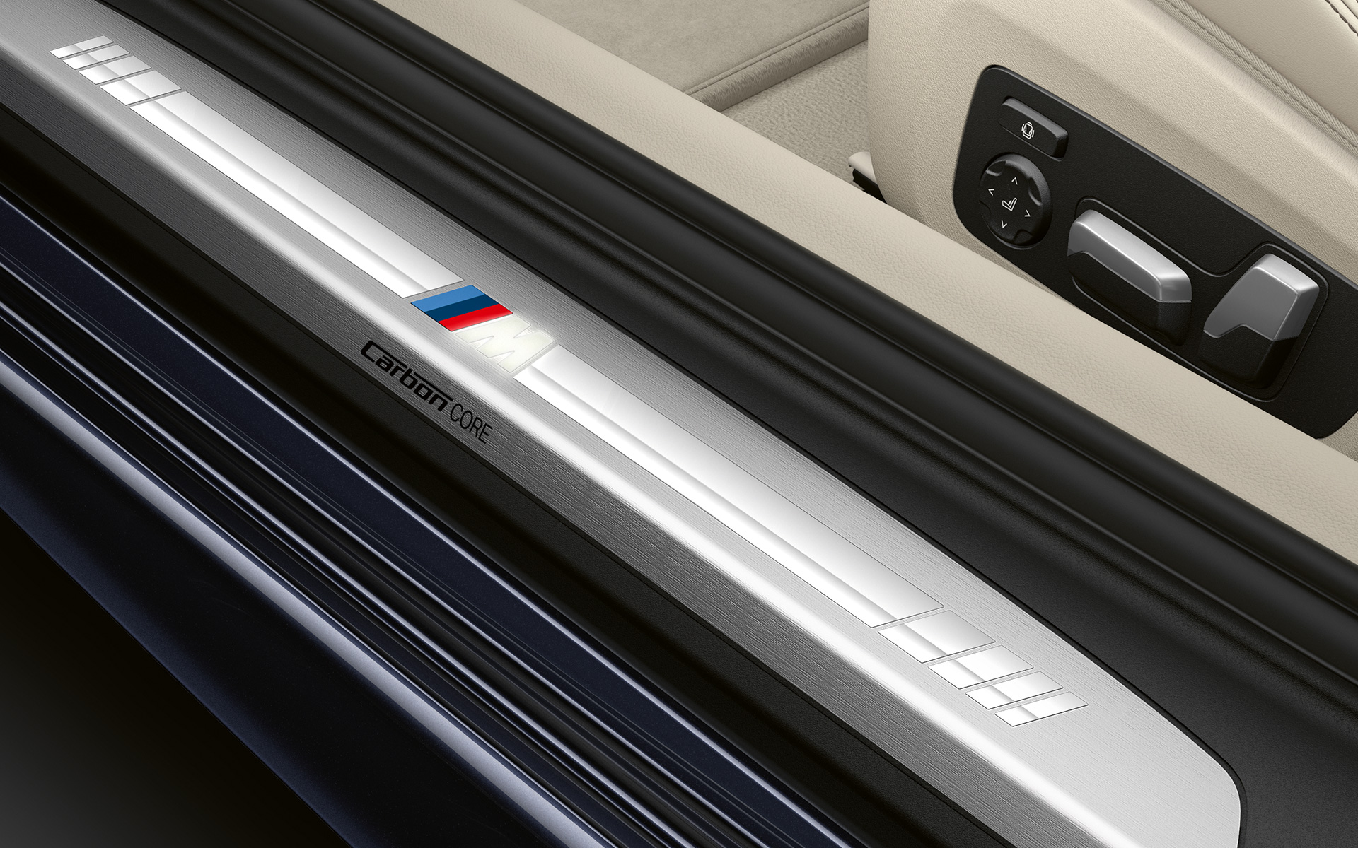 BMW 8 Series Coupé, door sill with M logo Close-up of the door sill of the BMW 8 Series Coupé with M logo.