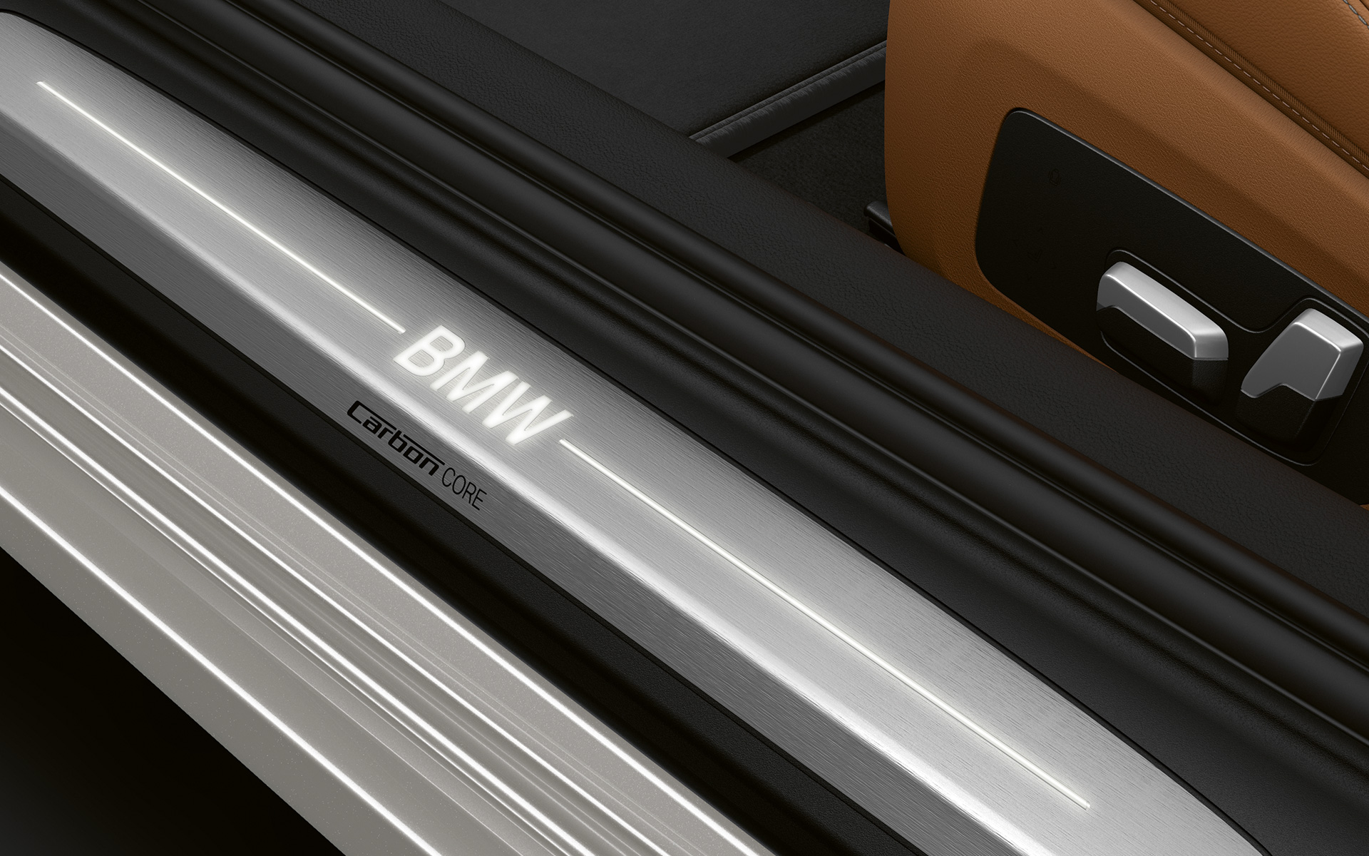 BMW 8 Series Coupé, door sill with BMW logo Close-up of the door sill of the BMW 8 Series Coupé with BMW logo.