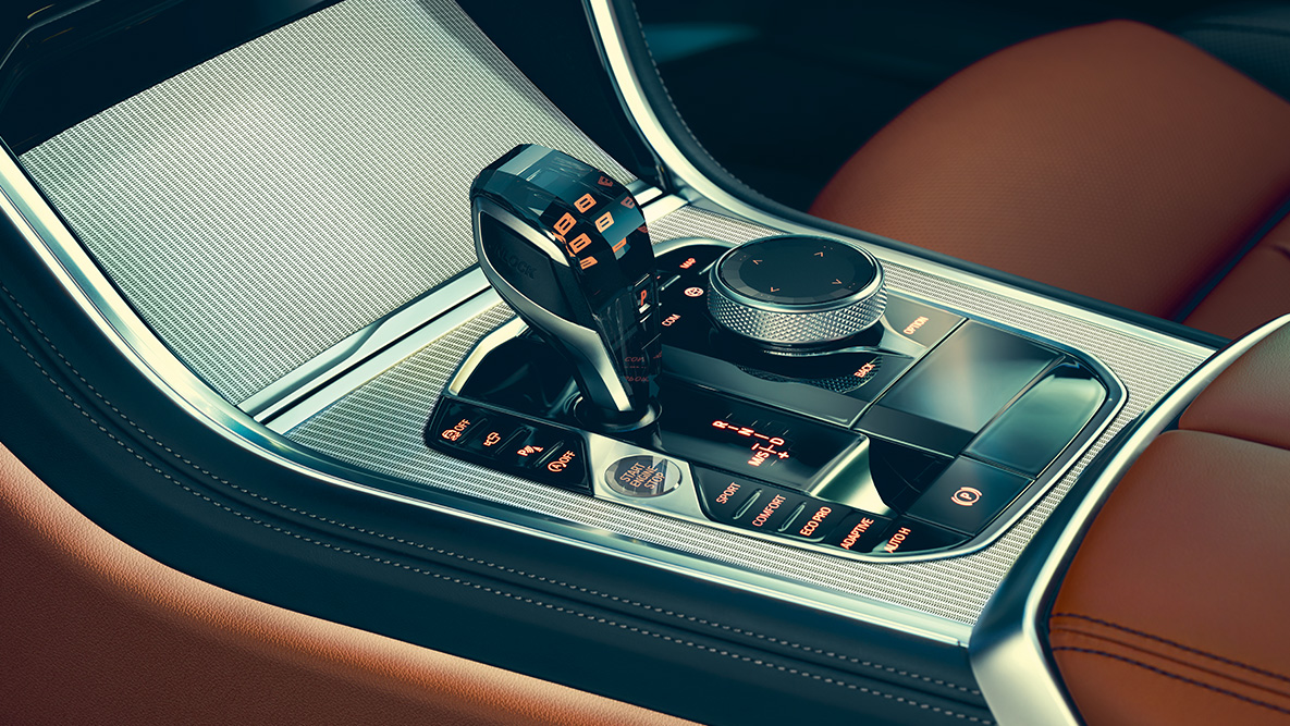 BMW Série 8 Coupé, consola central. Grande plano do interior do BMW Série 8 Coupé com destaque para a consola central.