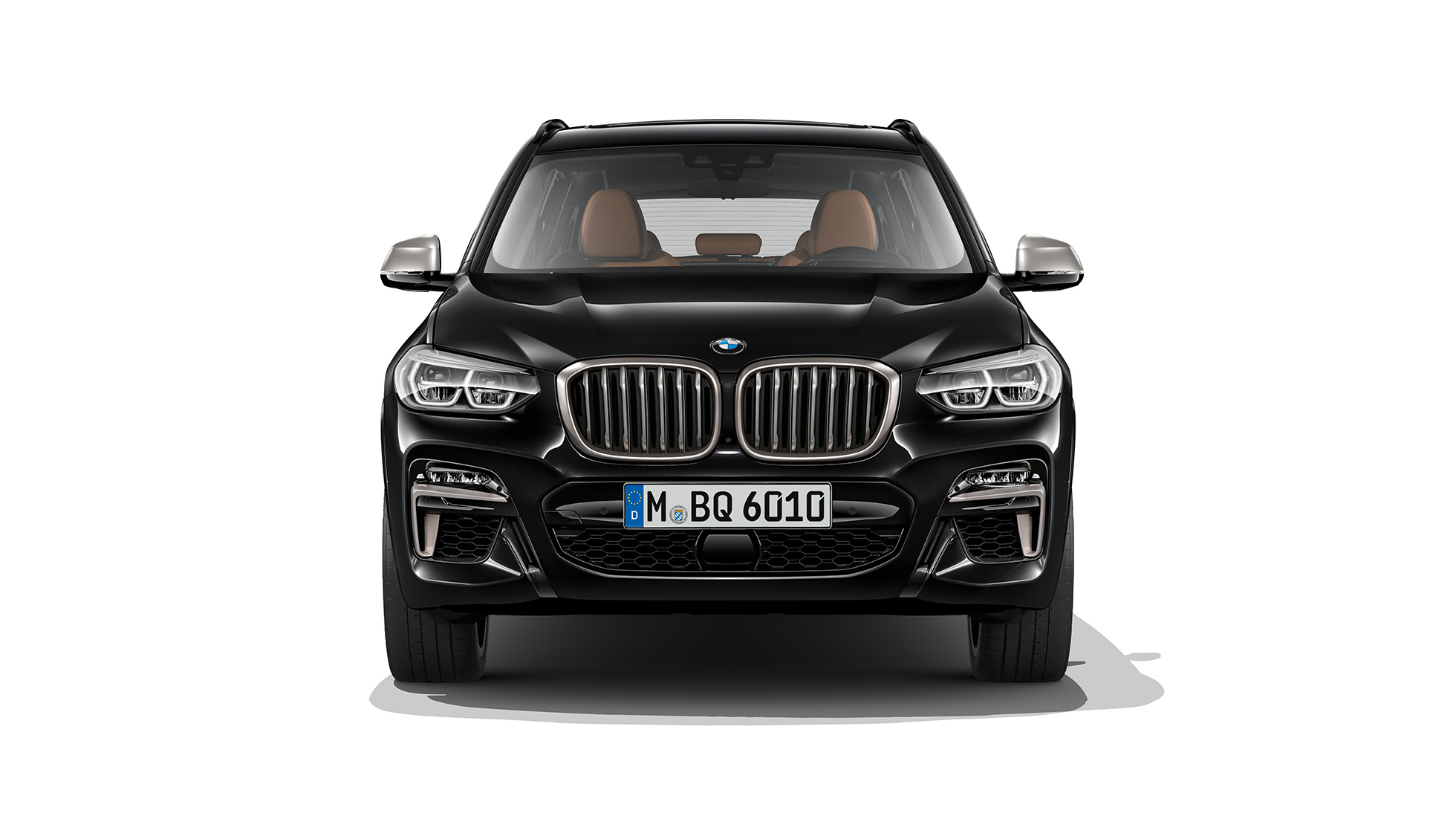 BMW X3 M40d, perspetiva frontal. BMW X3 M40d na pintura preto Sapphire metalizada, exterior, perspetiva frontal.