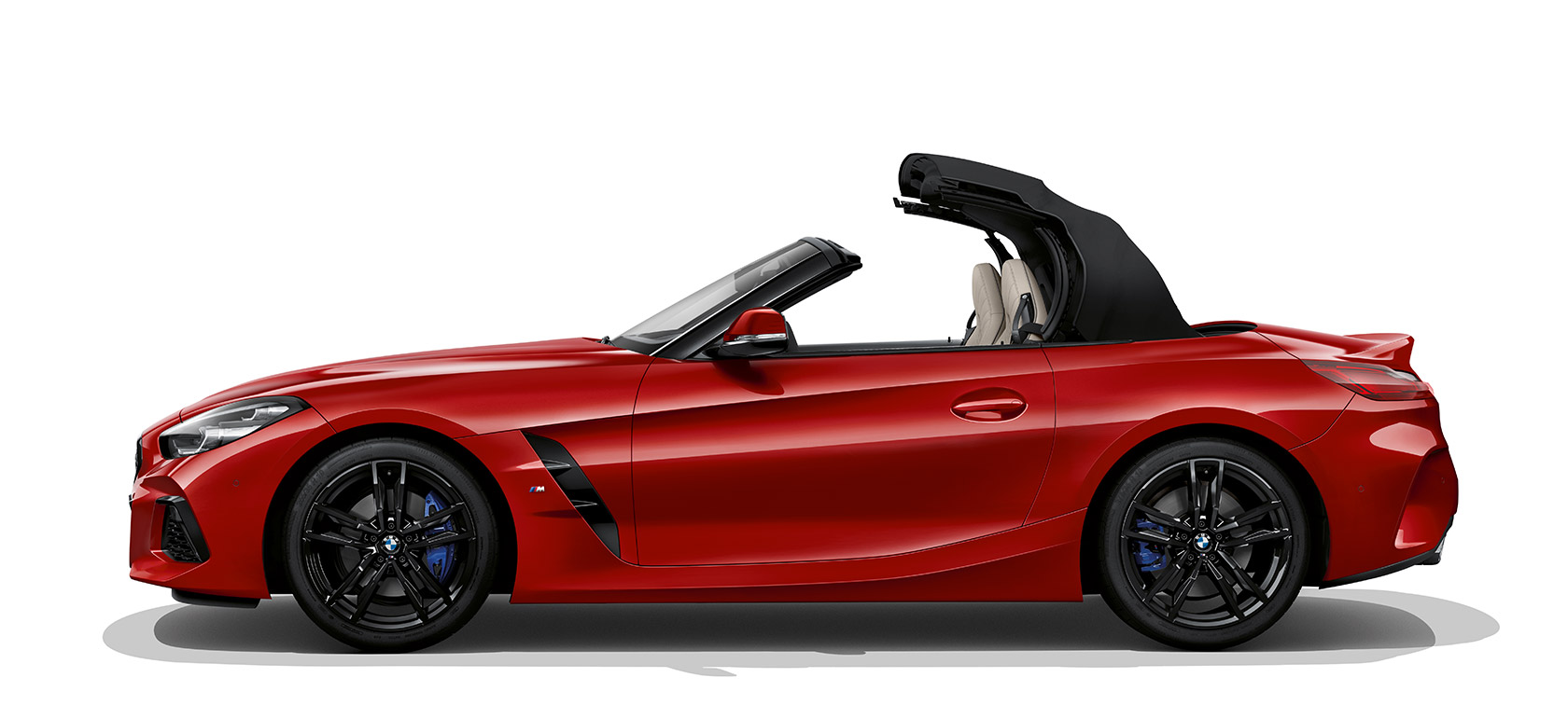 Perspetiva lateral do BMW Z4 Roadster Perspetiva lateral do BMW Z4 Roadster com a capota a abrir