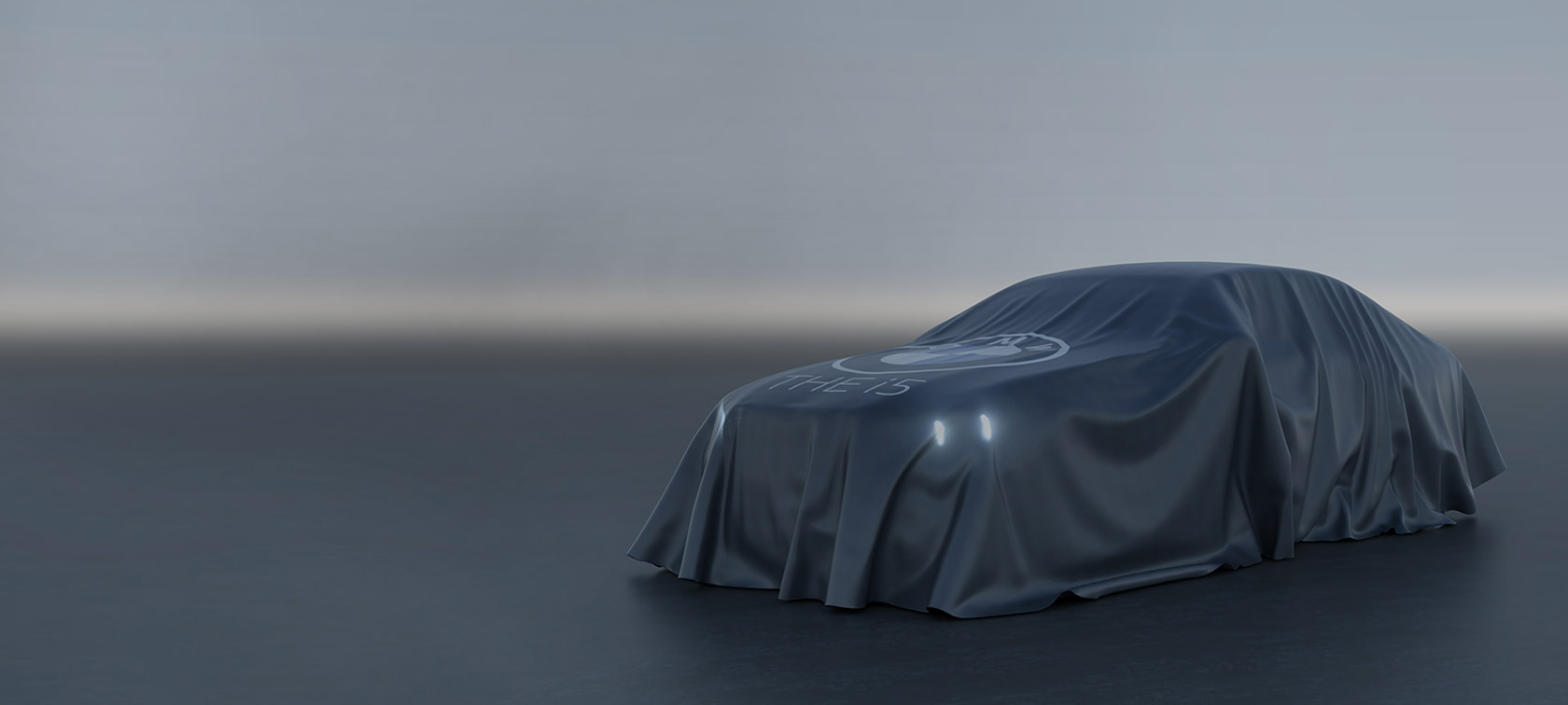 BMW i5 dissimulado sob um pano com o símbolo da BMW.